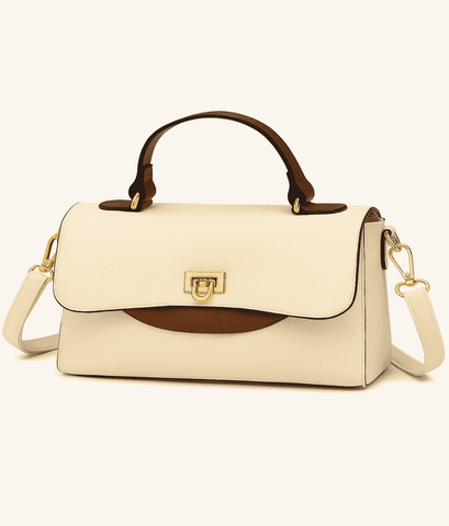 Beige handbag with brown accents on a white background